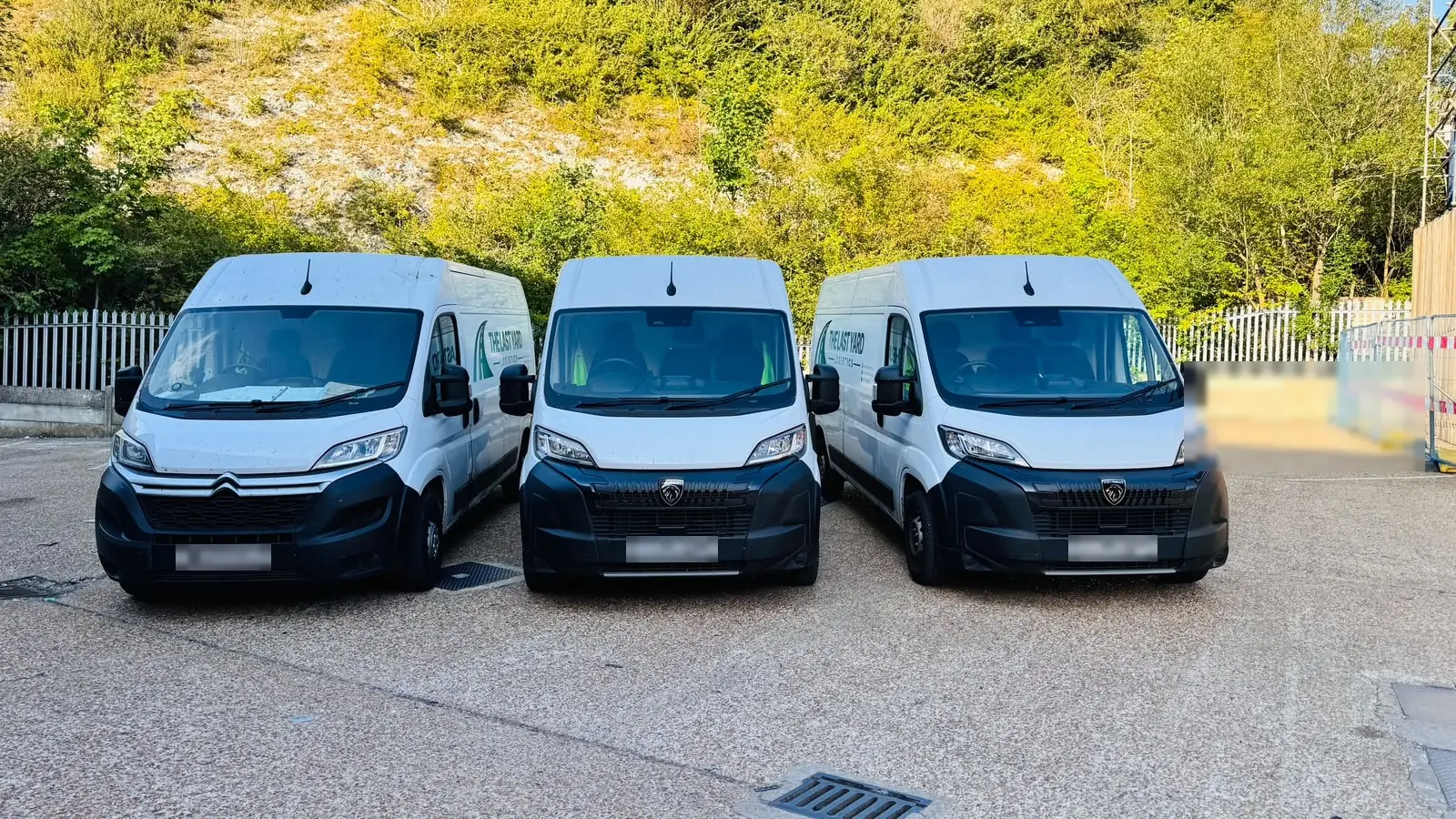 Three delivery vans lined up at the start of the working day