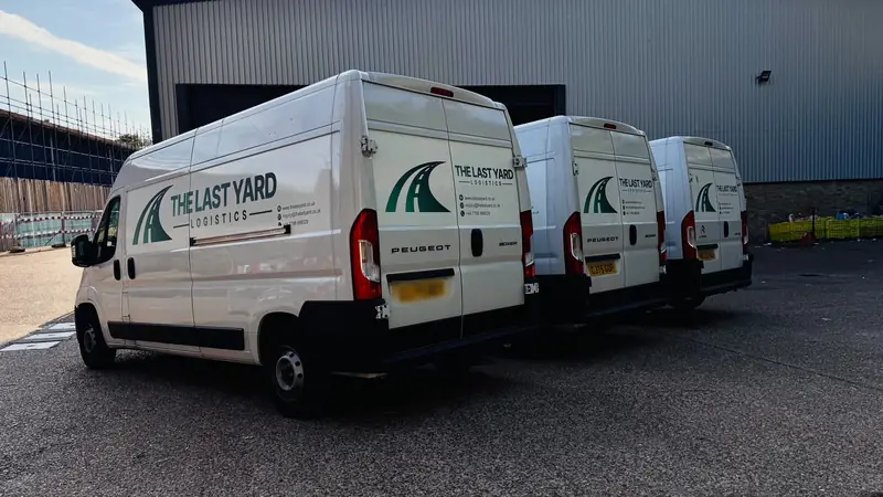 The Last Yard Logistics fleet at the warehouse loading area